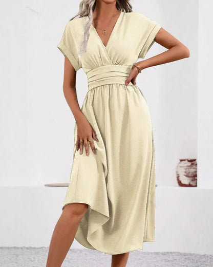 Jurk Dames: Elegante V-Hals Jurk met Vleermuismouwen & Geplooide Taille AtelierDress
